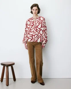 Blouse col V à imprimé géométrique terracotta Ambrine