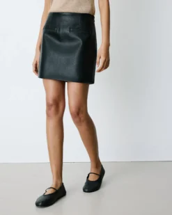 Mini-jupe en similicuir lisse noir Betty