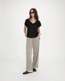 Top large en lurex col V noir Vaporo